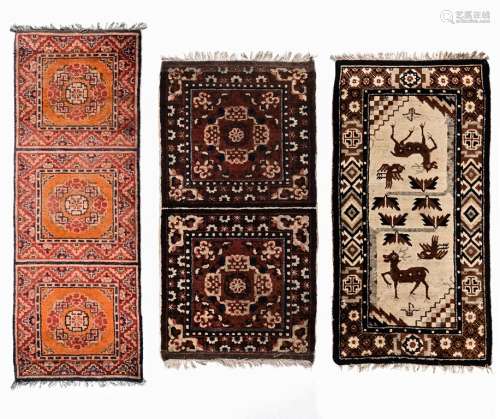 A group of three antique Chinese rugs