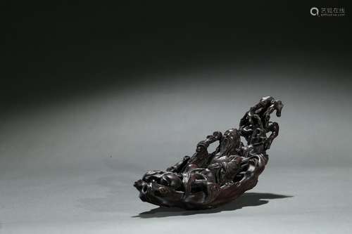 An agarwood 'Zhang Qian in hollow log' carving