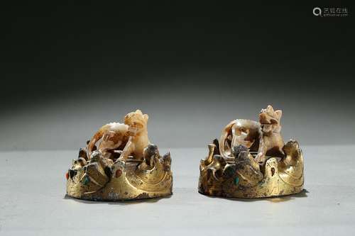 A pair of jade 'bixie' gilt bronze inlaid weights