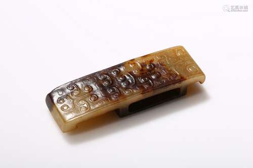 A white and russet jade sword slide