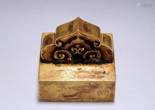 A square Gilt-Bronze Ruyi Seal