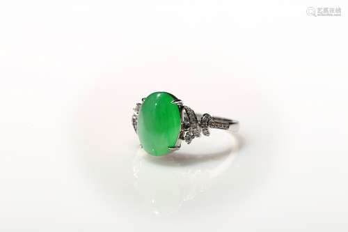 An icy apple green jadeite diamond ring