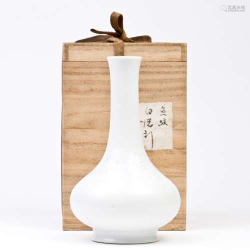 An incised White Glazed Vase