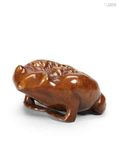 A PAPERWEIGHT IN THE FORM OF A TOAD