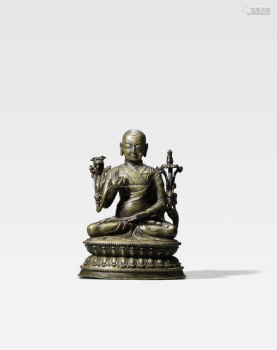 西藏 十五/十六世纪 错银错红铜贡噶嘉波铜像