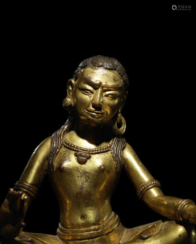 西藏 约十五世纪 铜鎏金大成就者恰利耶巴像