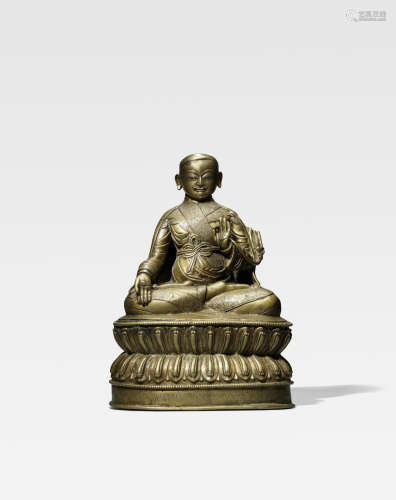 西藏 十五/十六世纪 铜错银萨钦贡噶宁波像