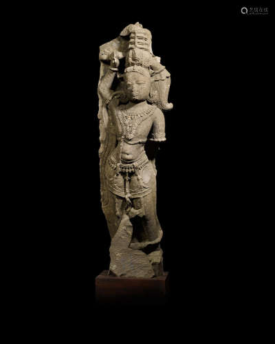 A RED SANDSTONE FIGURE OF A CHAURI BEARER RAJASTHAN, CIRCA 10TH CENTURY