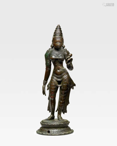 A LEADED BRONZE FIGURE OF BHUDEVI TAMIL NADU, CHOLA PERIOD, 10TH/11TH CENTURY