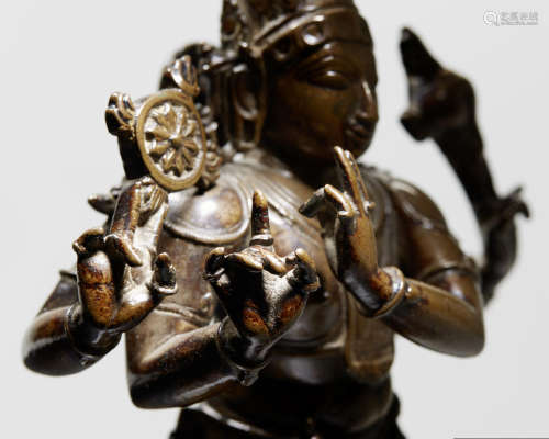 A COPPER ALLOY FIGURE OF FLUTING VISHNU SOUTH INDIA, 16TH/17TH CENTURY