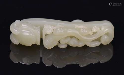 A Celadon White Jade Carved ‘Chi Dragon’ Bell-Buckle’