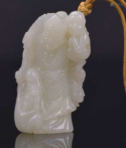 A White Jade Carved ‘Jigong’ And Monkey