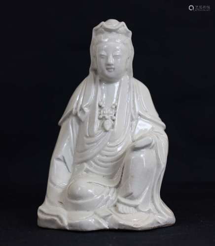 A White Porcelain Buddha Statue