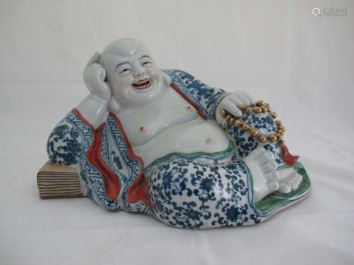 A Chinese Porcelain Buddha Statue