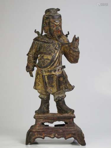 A Chinese Gilt-Bronze Guangong, Qing Dynasty