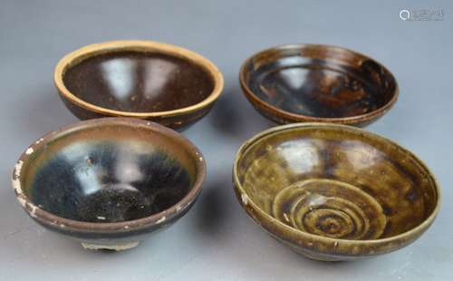 Four Chinese Black Glazed Porcelain Bowls