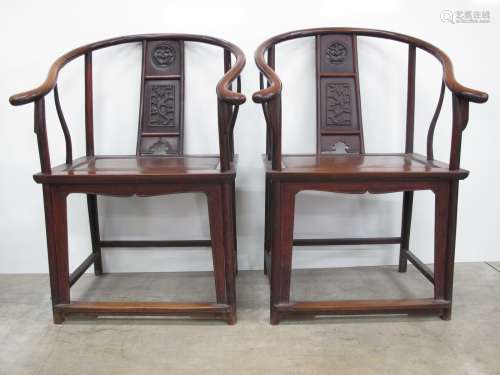 A pair of Huang Hua Li Horseshoe Back Armchairs