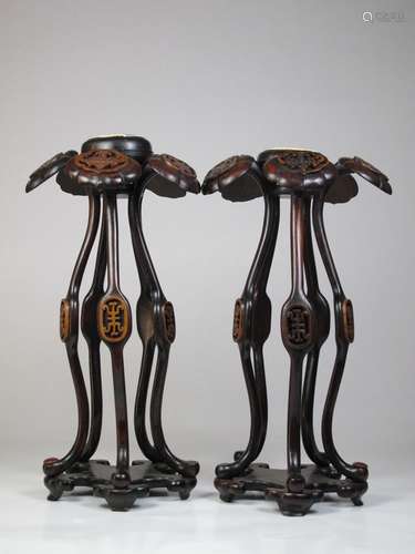 A pair of rose wood hat stand