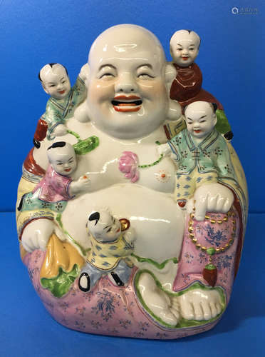 A FAMILY ROSE PORCELAIN YOUNG MAITREYA BUDDHA