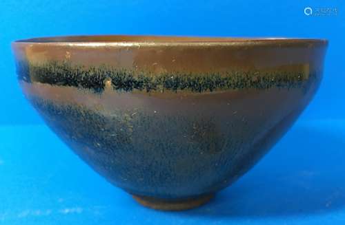 A CERAMIC CONIAL BOWL