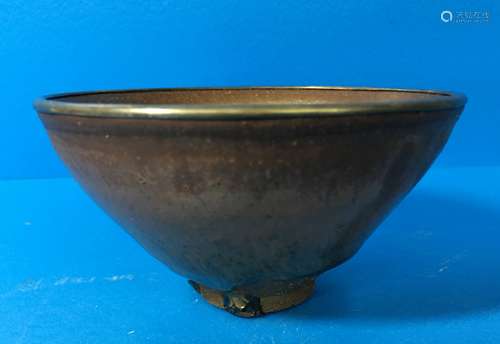 A CERAMIC CONIAL BOWL