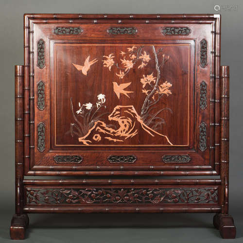 A BAMBOO-CARVED SCREEN