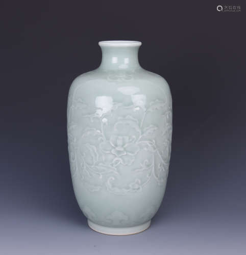 A CELADON VASE WITH UNDERGLAZED FLOWER BLOSSOM