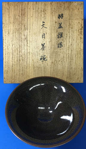 A TEMMOKU GLAZED CERAMIC BOWL