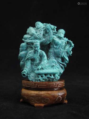 Carved Turquoise Character