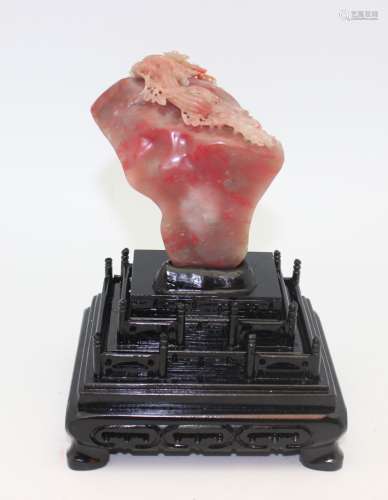 CHICKEN BLOOD STONE SCULPTURE WITH WOOD BASE