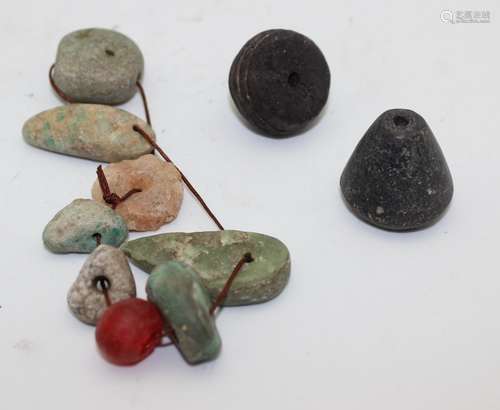 A GROUP OF ANCIENT STONE BEADS