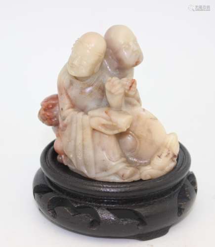 SOAPSTONE SCULPTURE WITH WOOD BASE