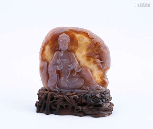 A Chinese Carved Agate Guanyin Figure with Base