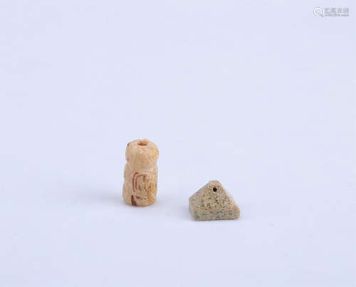 A Set of Two Chinese Carved Jade Pendants