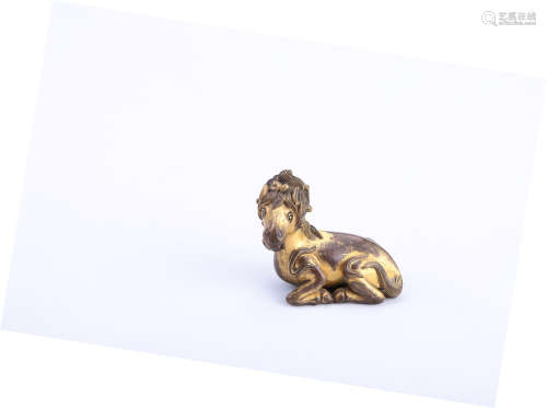 A Chinese Gilt Bronze Foo Dog Paper Weight