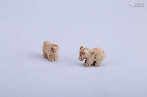 A Set of Two Chinese Carved Jade Foo-Dogs