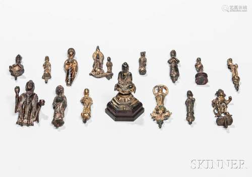 Fifteen Buddhist Gilt-bronze and Bronze Miniature Items