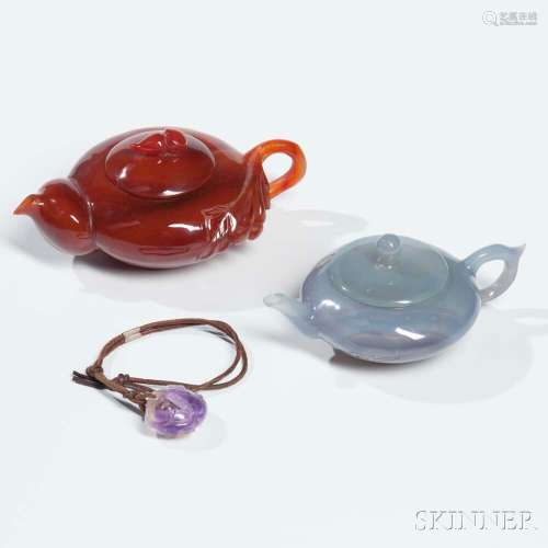 Two Carved Stone Teapots and a Pendant