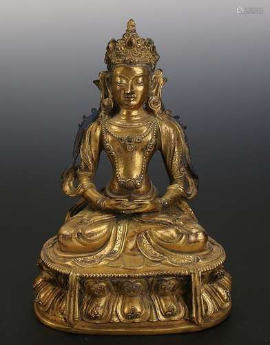 ANTIQUE Chinese Ming Dynasty Gilt Bronze Buddha (AD 1368-1644) figure, finely cast, seated in full lotus position upon lotus throne, hand in Dhayana-Mudra, gesture of balance meditation, ornate headdress and necklaces. Blue patina remains on hair.7 1/2