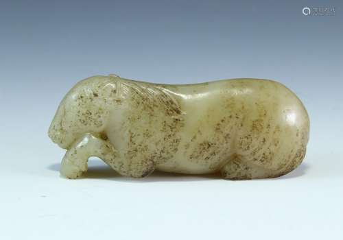 A Chinese Carved White Jade Horse