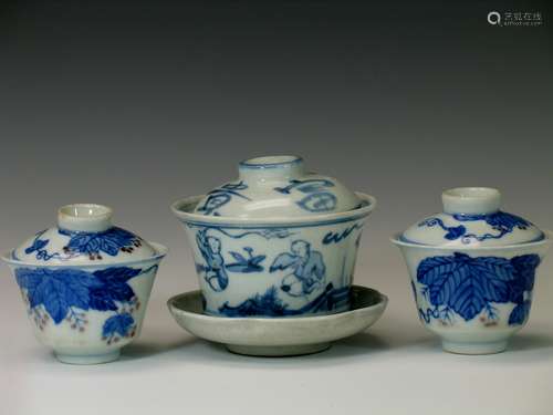 Three Chinese blue and white porcelain cups with lids.