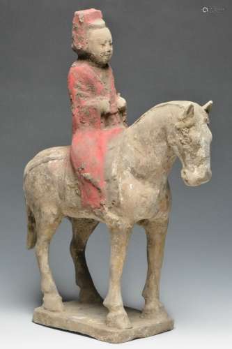 A Painted Pottery Equestrian Figure, Tang Dynasty