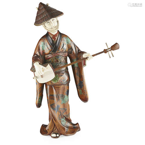 IVORY AND LACQUERED WOOD OKIMONO OF A GEISHA PLAYING THE SHAMISEN,MEIJI PERIOD