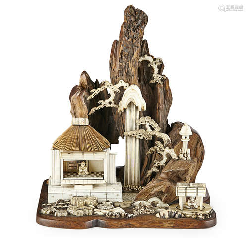 CARVED IVORY AND WOOD OKIMONO OF A MOUNTAIN,MEIJI PERIOD