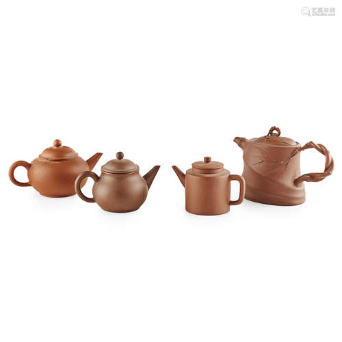 COLLECTION OF FOUR YIXING STONEWARE TEAPOTS AND COVERS