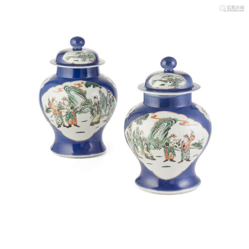 PAIR OF FAMILLE VERTE POWDER-BLUE GROUND BALUSTER JARS AND COVERS,KANGXI MARK BUT 19TH CENTURY