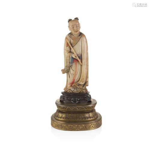 CARVED SOAPSTONE FIGURE OF THE IMMORTAL HAN XIANGZI,QING DYANSTY, 19TH CENTURY