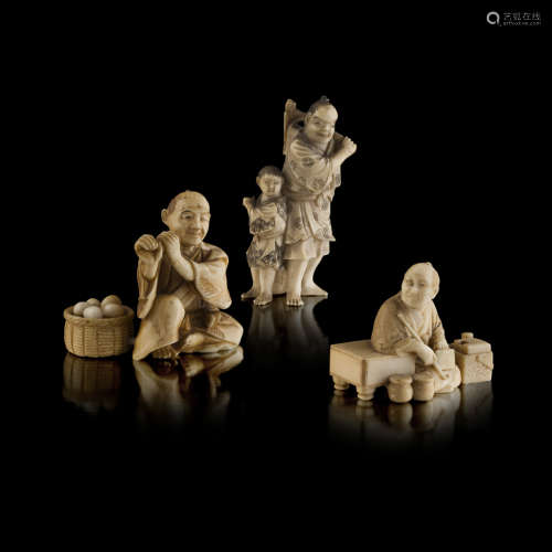 CARVED IVORY OKIMONO OF A GO PLAYER,SIGNED SHIZU, MEIJI PERIOD