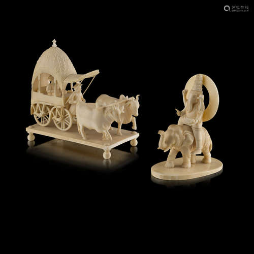 CARVED IVORY FIGURE OF GANESHA ON AN ELEPHANT,LATE 19TH/EARLY 20TH CENTURY