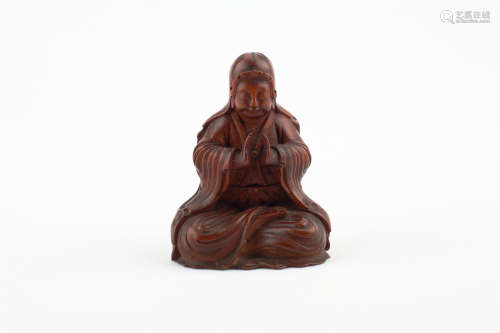 A Chinese Carved Boxwood Figure